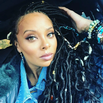 Image of a girl with a protective style and curled ends. Taken from Instagram/Eva Marcille