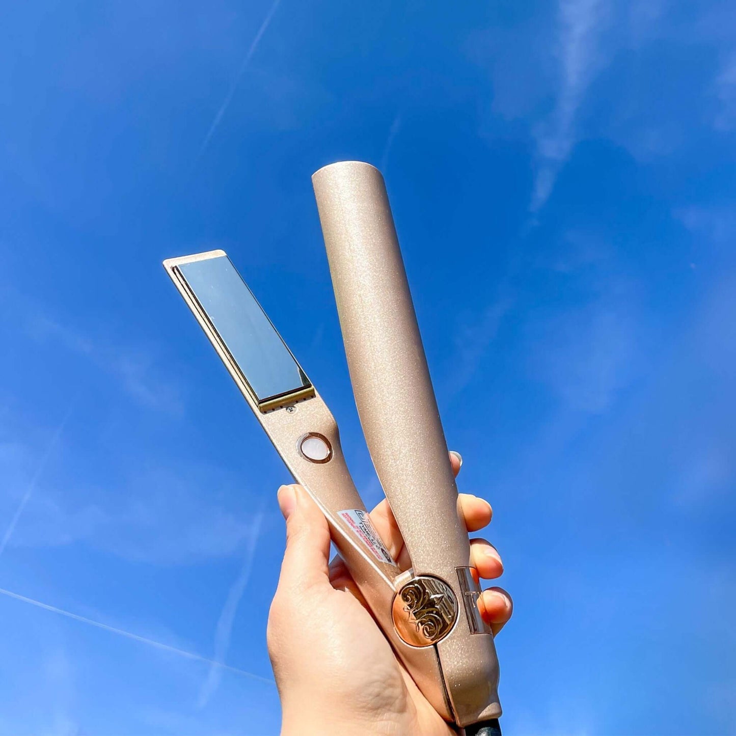 TYME Iron Pro being held in a woman's hand.