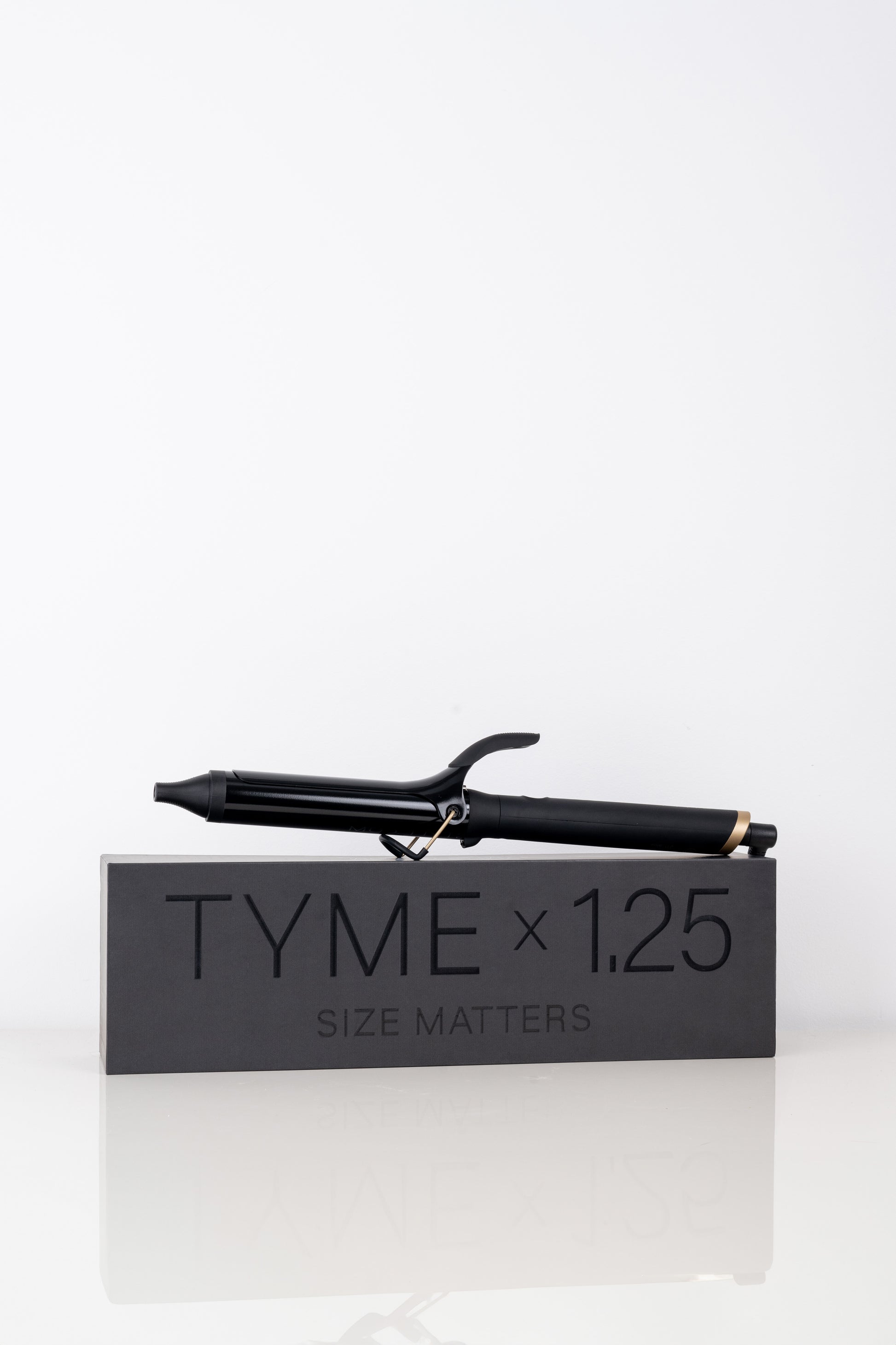 1.25" Curling Iron sitting on Box by TYME STYLE