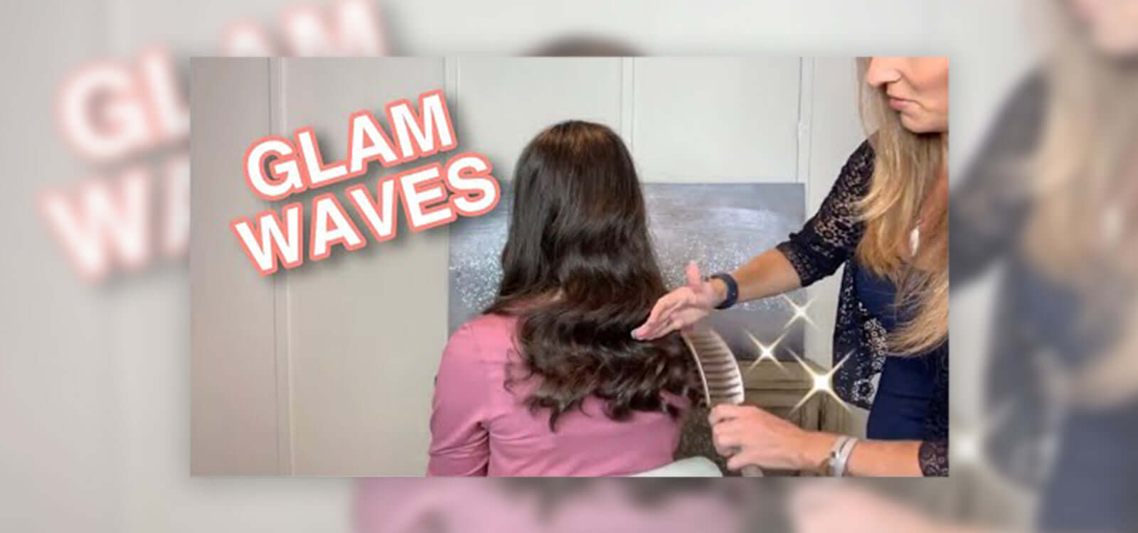 professional hair stylist putting glamorous waves in lady's hair