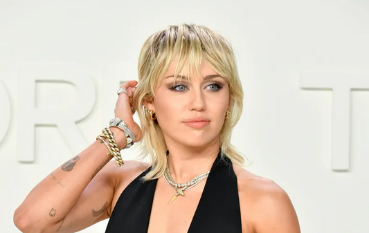Image of Miley Cyrus with a wolf cut.