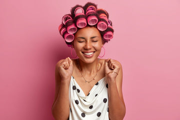 Image of a girl with rollers in her hair.