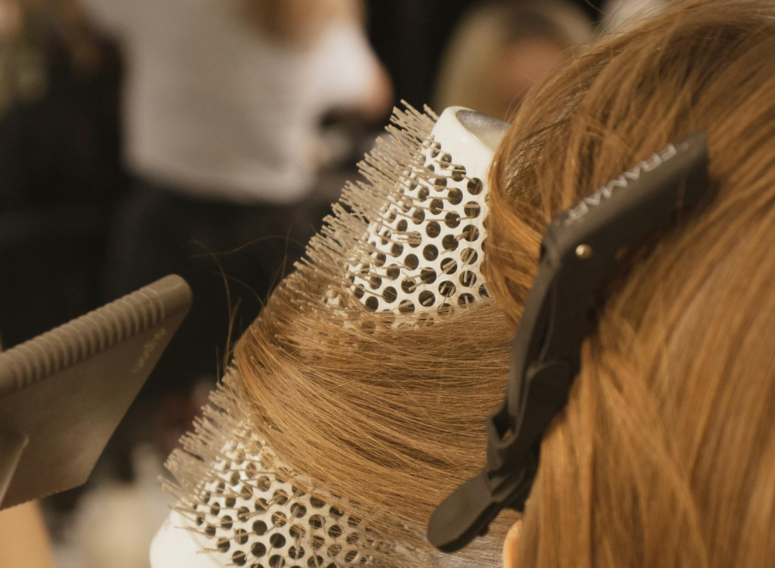 Image of someone getting a blow-dry