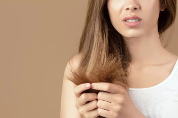 Woman holding split ends
