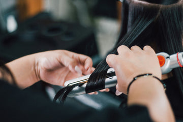 The big hair debate—Curling iron vs hot rollers?