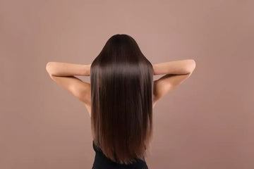 Woman with sleek, straight hair
