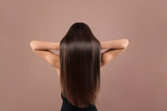 Woman with sleek, straight hair