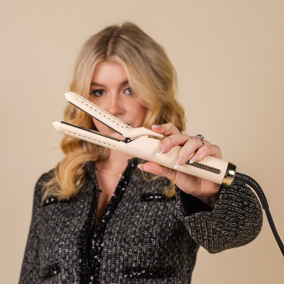 The TYME Iron Air in Cashmere being used to style long hair