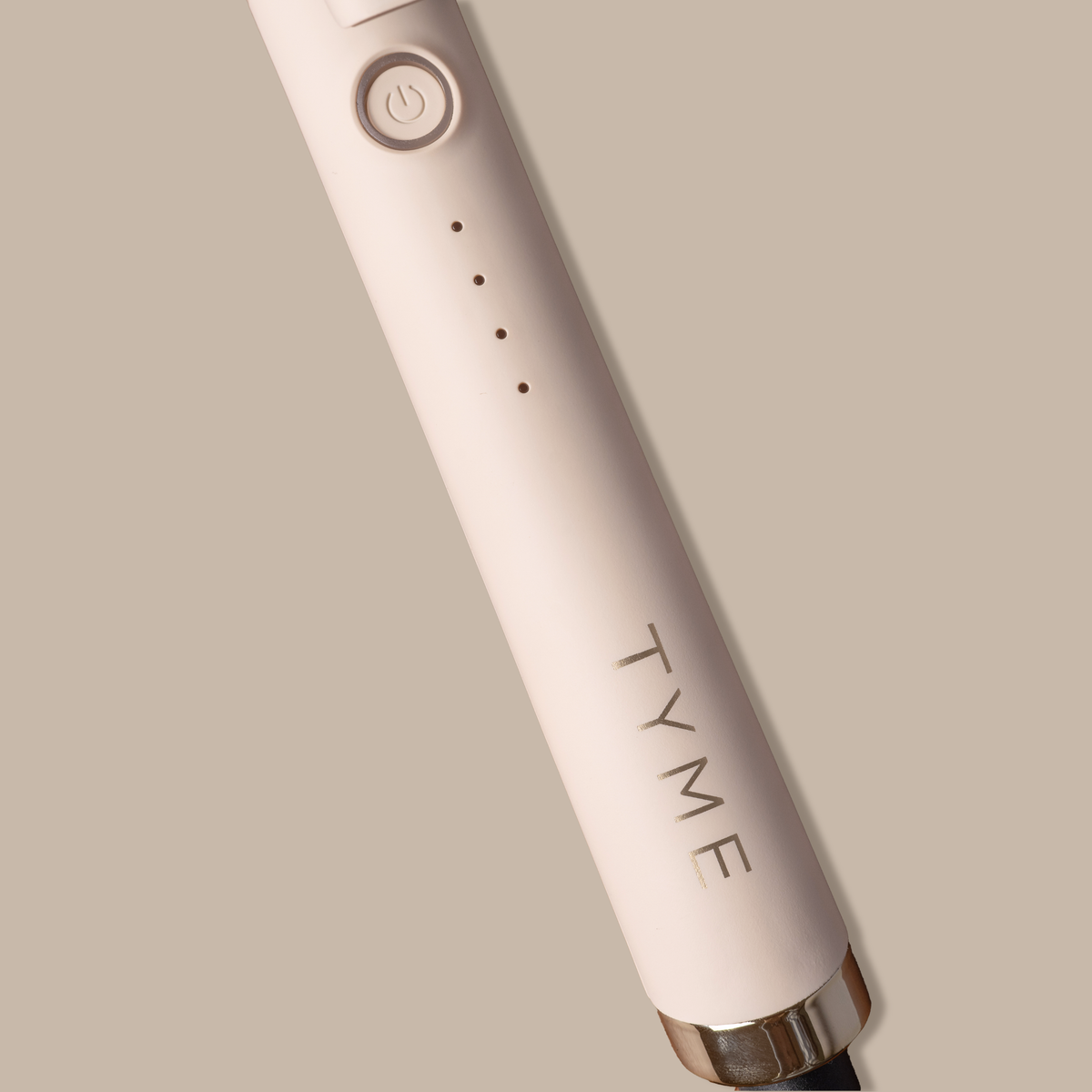 TYME 1.25 inch curling iron in Cashmere, heat settings