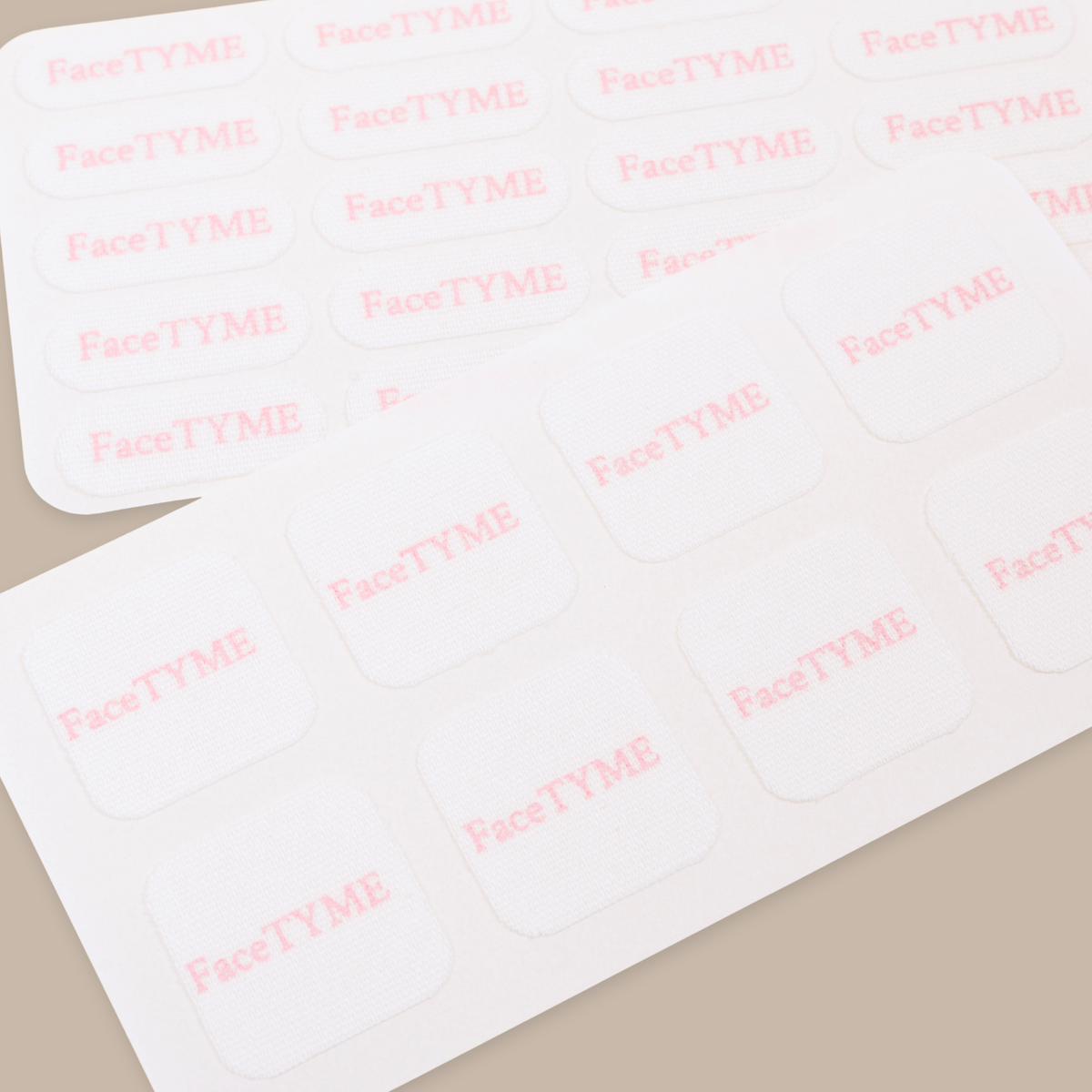 FaceTYME face tape box with 104 square tapes and 100 pill shaped tapes