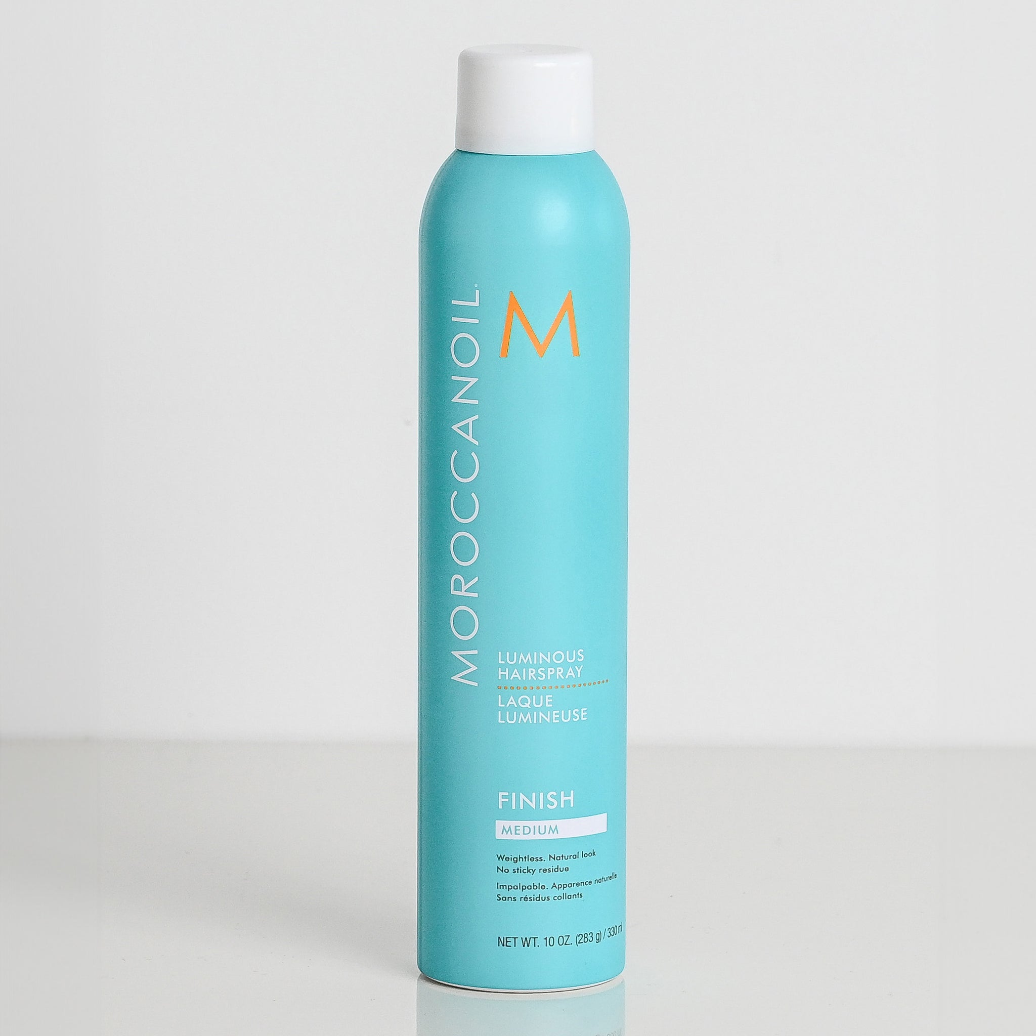 Turquiose bottle of Moroccanoil hydrating shampoo