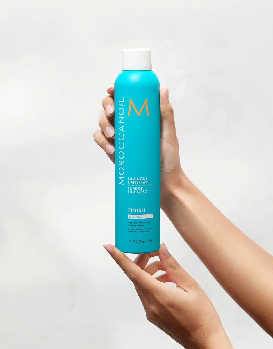Turquiose bottle of Moroccanoil hydrating shampoo