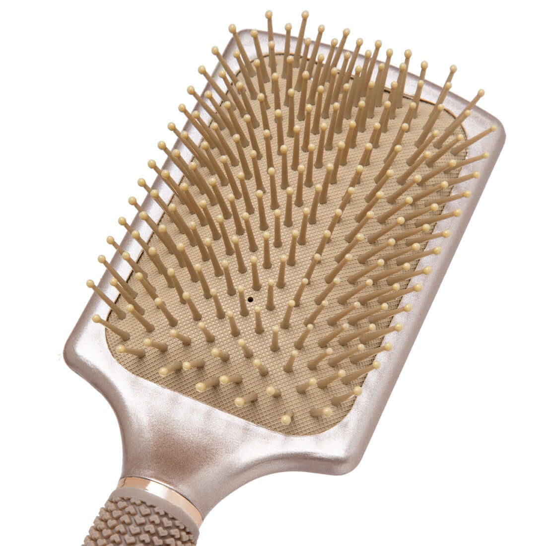 Zoomed in view TYME Paddle Hair Brush showing comfort nylon bristles on the cushioned head.