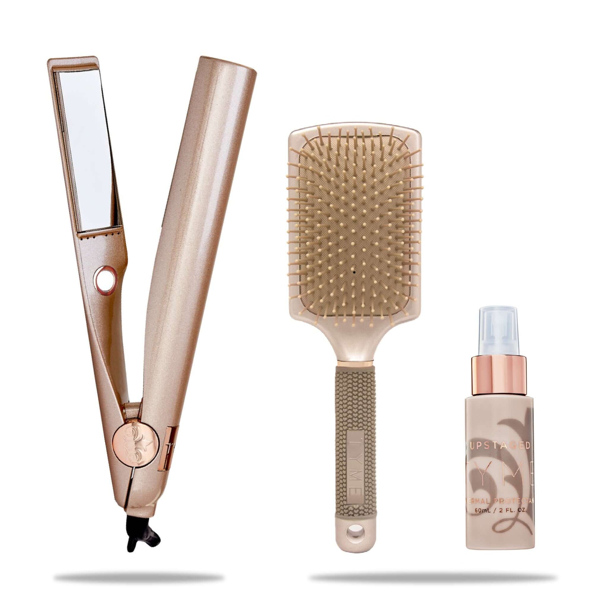 tyme iron pro all in one iron in rose gold with professional hair brush and travel upstaged thermal heat protectant spray in rose gold bottle
