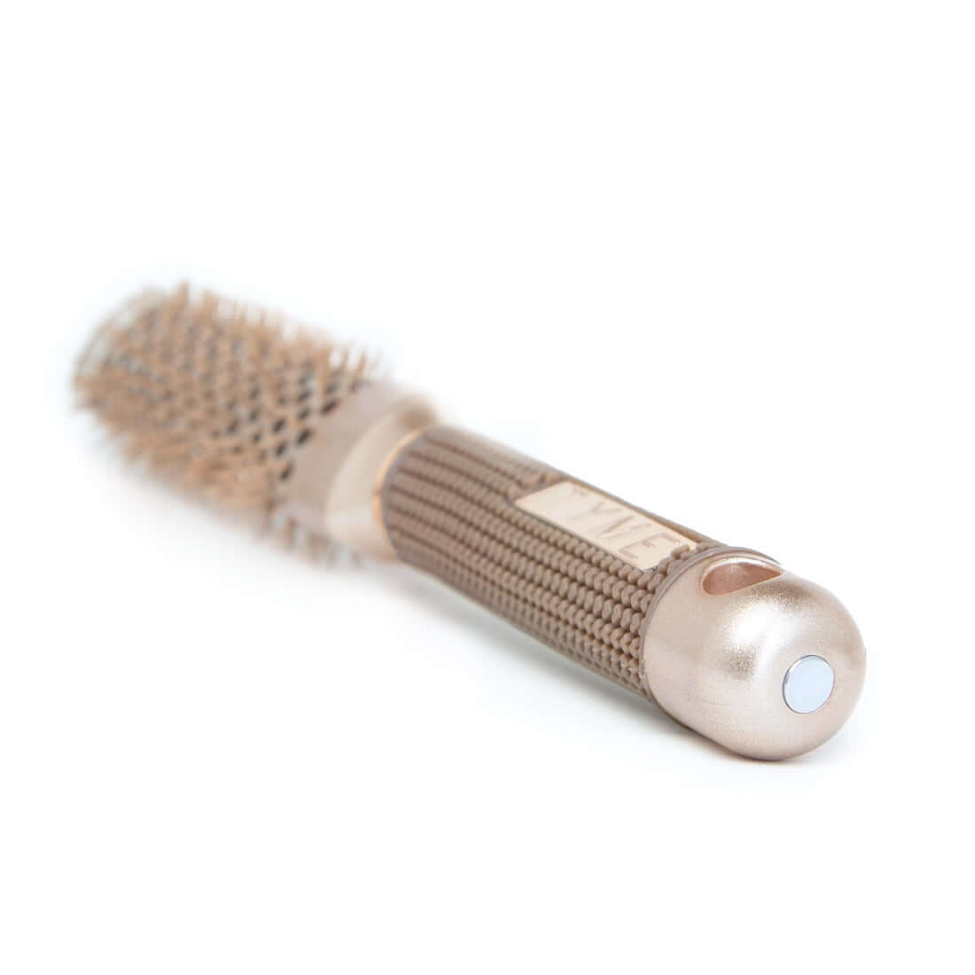 End of handle on TYME Triangle Hair Brush showing hole for hook storage and magnet for alternative storage.
